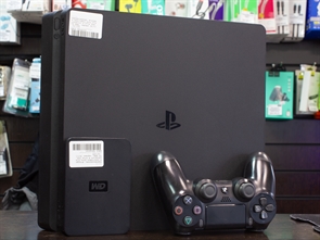 Игровая приставка Sony PlayStation 4 Slim 500 ГБ HDD, 92 игры, дополнительный аксессуар: HDD 1 ТБ, черный (Б/У)